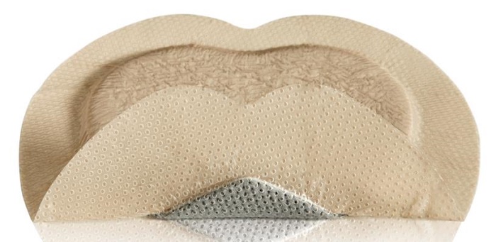 MEDICAZIONE IN SCHIUMA DI POLIURETANO MEPILEX BORDER AG CONFORMATA PER SACRO CON ARGENTO ASSORBENTE ANTIMICROBICA BORDO INTEGRATO STRATO DI CONTATTO IN SILICONE MORBIDO 18X18 CM 5 - farmasconti.eu